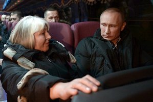 Prezident Putin v autobuse s prostými lidmi.